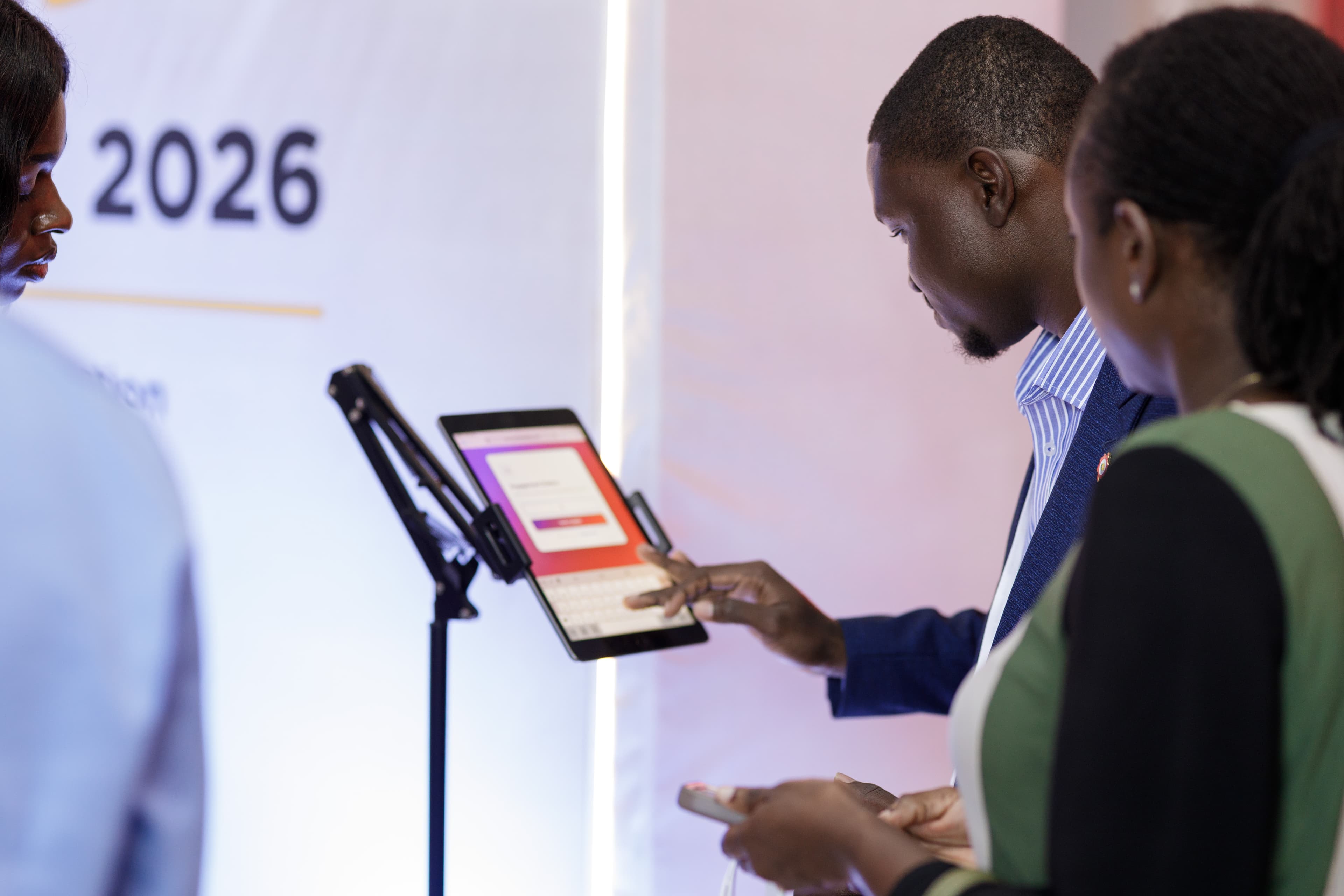 Delegates checking in quickly at a branded registration point